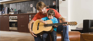 Kid-playing-guitar